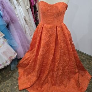 Jules & Cleo Strapless Textured Orange Ball Gown